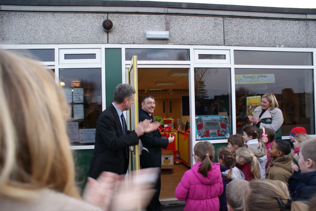 cutting the ribbon at the new classroom